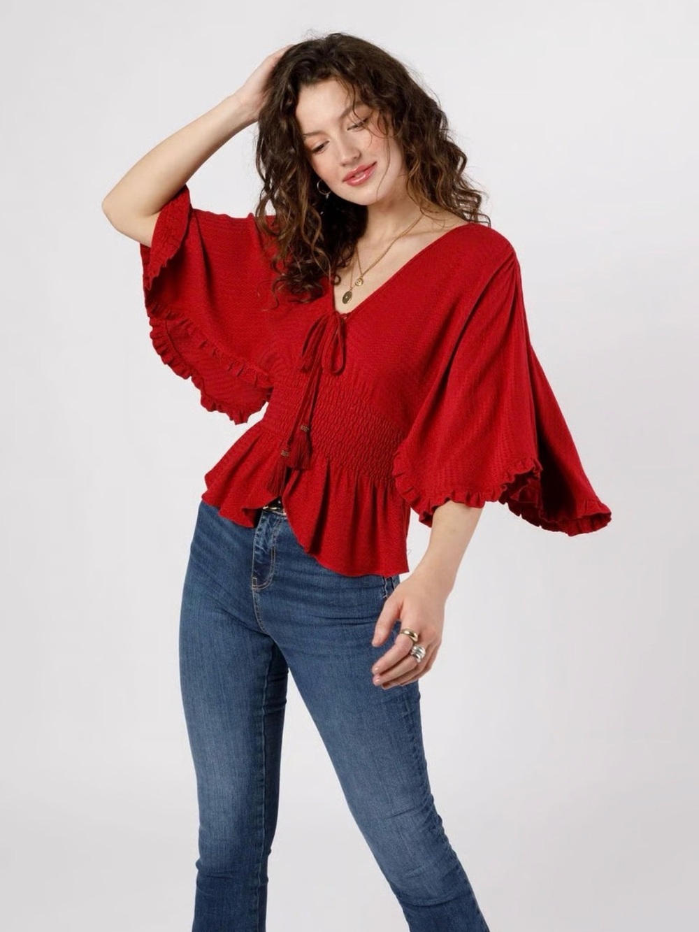 Smocked V-Neck Peplum Tunic in Rich Red